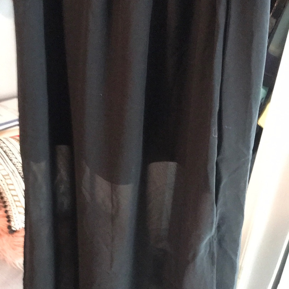 Black mini skirt with long sheer overlay